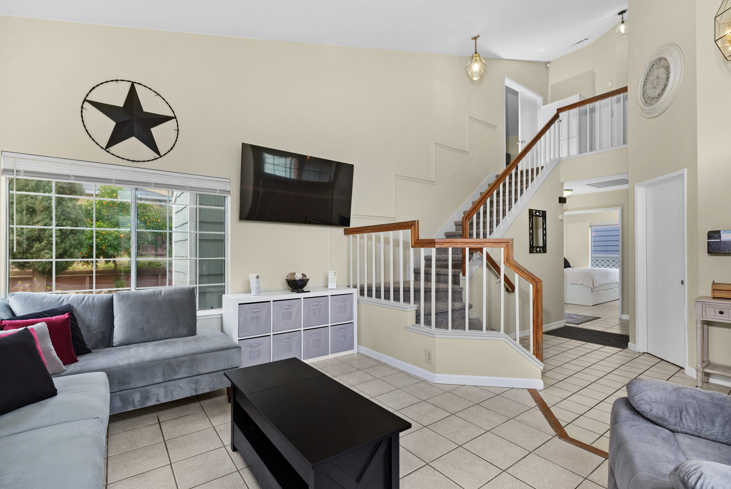 Comfortable common area seating in a clean, welcoming home
